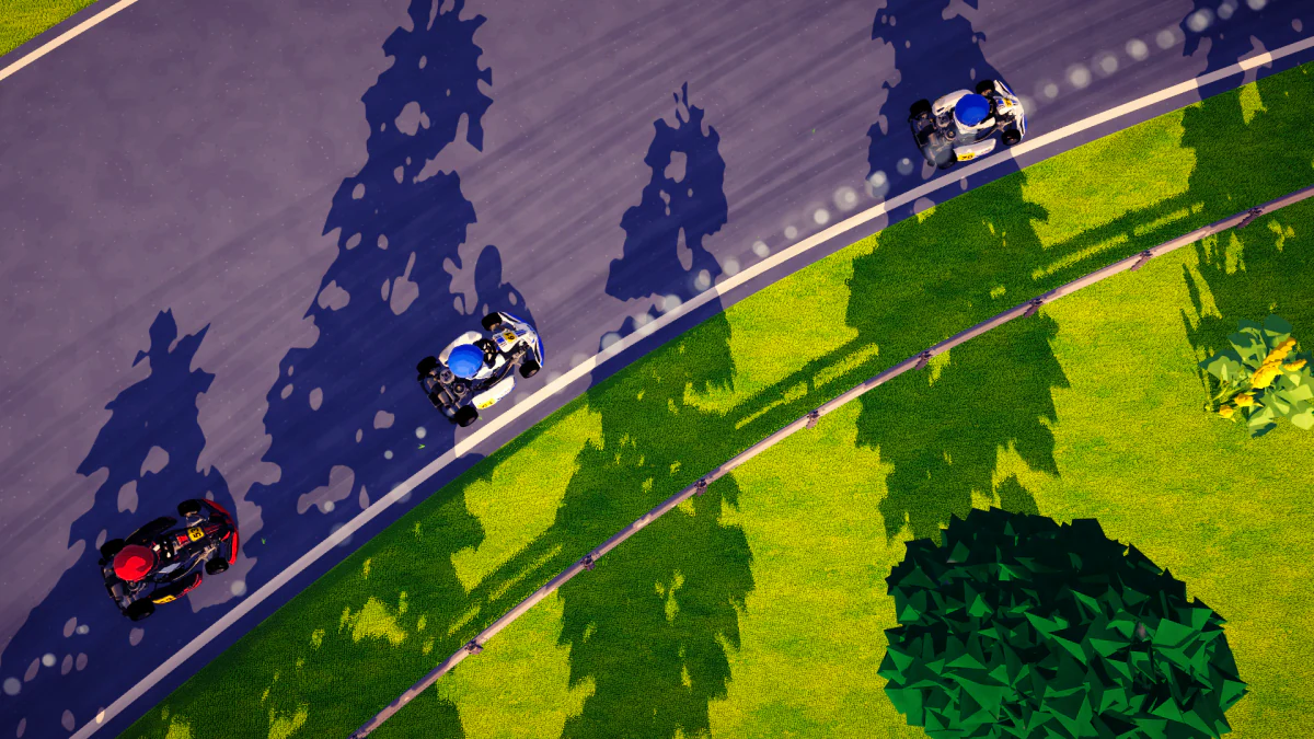 Karts lined up through a corner, seen from above